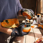 person changing STIHL FSA 70 R Battery Grass Trimmer AK System Kit at Cannings. A versatile battery grass trimmer kit with battery and charger for trimming, mowing and clean-up work.