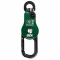 A green and black Buckingham OX Block climbing harness anchor device with a carabiner, shown on a plain white background.